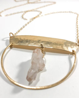 U Shape Pendant with Clear Quartz Crystal in Gold Fill on White